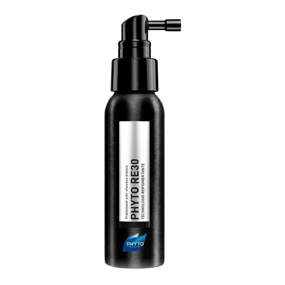 Flacon noir avec pompe. Inscription PHYTO RE30. Traitement anti-cheveux blancs.