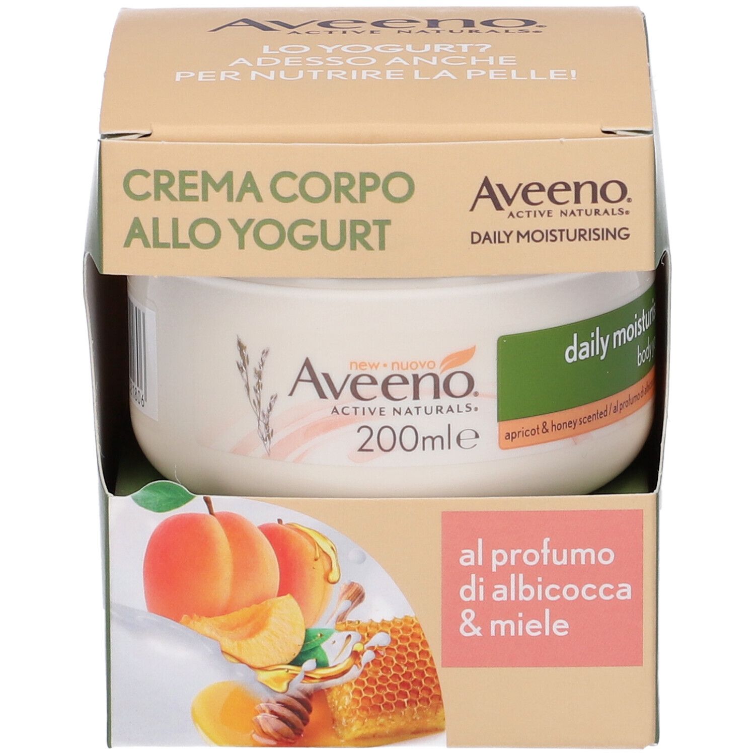 Vaso di crema in confezione. Scritta Aveeno, Daily Moisturising, 200ml. Illustrazione di albicocche e favo. Testo: al profumo di albicocca & miele.