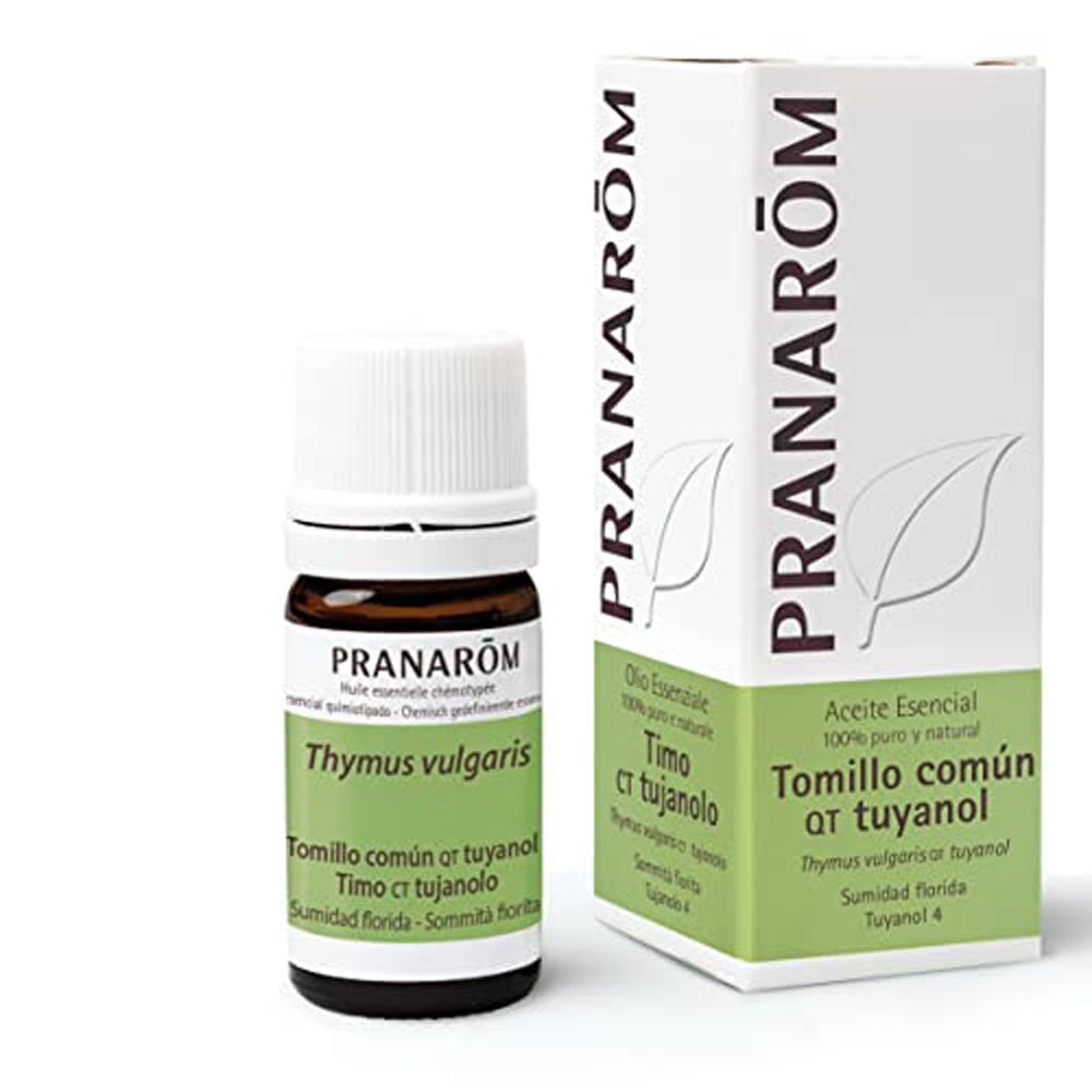 Flacone di vetro marrone con tappo bianco ed etichetta. Scatola bianca con etichetta verde. Scritta: PRANAROM, Thymus vulgaris.