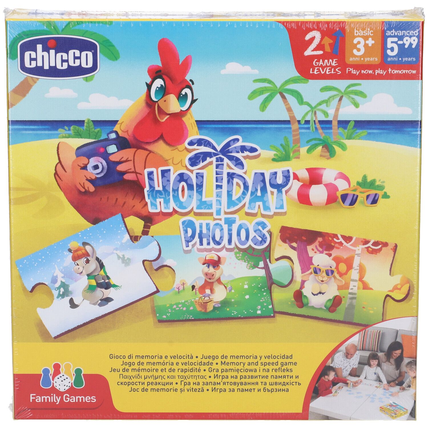 Scatola del gioco "Holiday Photos". Sono raffigurati pezzi di puzzle con motivi di animali, una gallina ed elementi spiaggia.