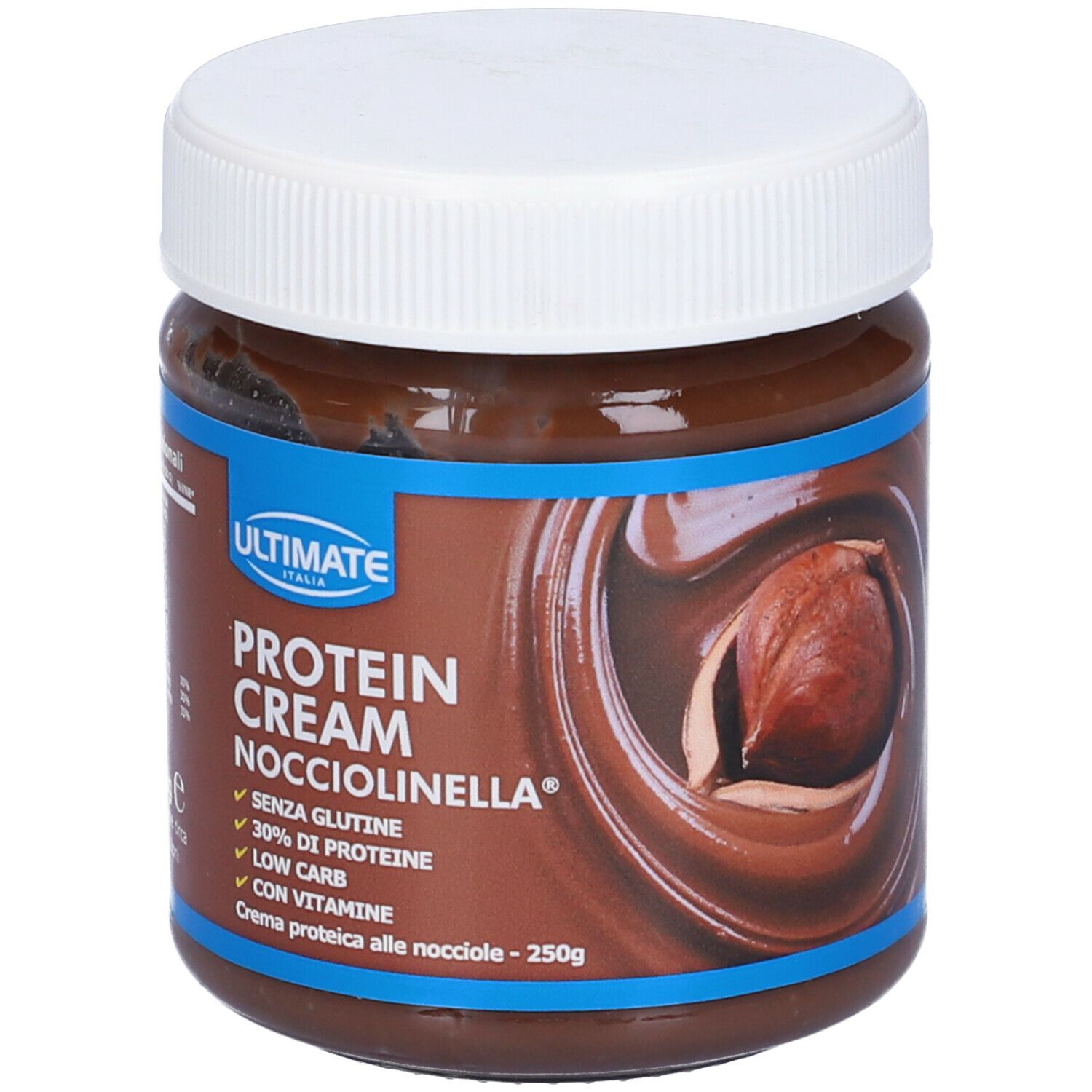 Vaso di crema proteica. Scritta: Protein Cream Nocciolinella, 30% proteine, senza glutine, low carb, con vitamine. Nocciola.
