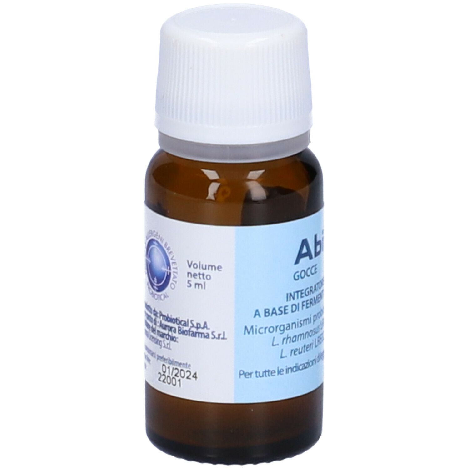 Flacone di vetro marrone con tappo bianco. Etichetta con informazioni e volume del prodotto. Integratore alimentare per bambini.