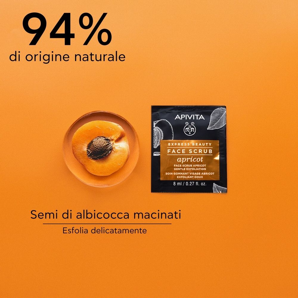 Confezione del prodotto accanto a una mezza albicocca. Scritto: APIVITA EXPRESS BEAUTY FACE SCRUB apricot. 94% di origine naturale.