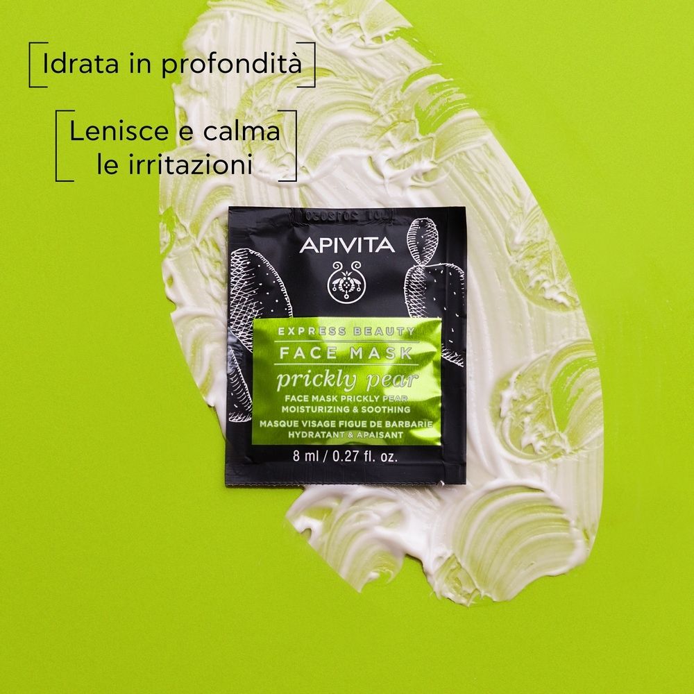 Confezione nera di maschera viso su sfondo verde con crema bianca. Scritta: EXPRESS BEAUTY FACE MASK prickly pear.