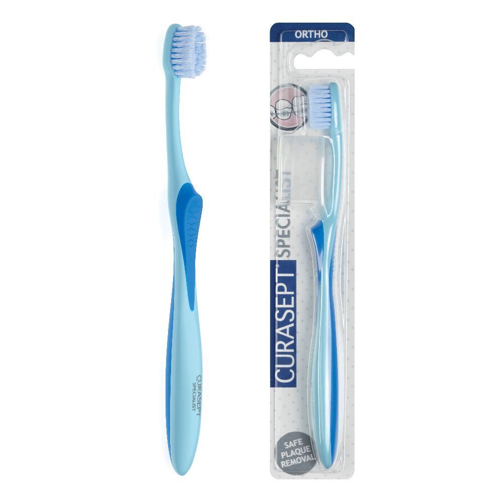 Spazzolino azzurro con manico blu. Confezione con nome del prodotto e indicazione "Ortho". Setole visibili.