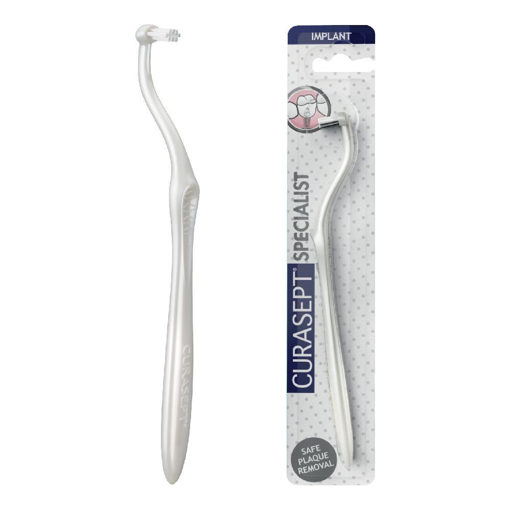Spazzolino speciale per impianti dentali. Manico bianco curvo, testina piccola. Confezione con nome e logo.