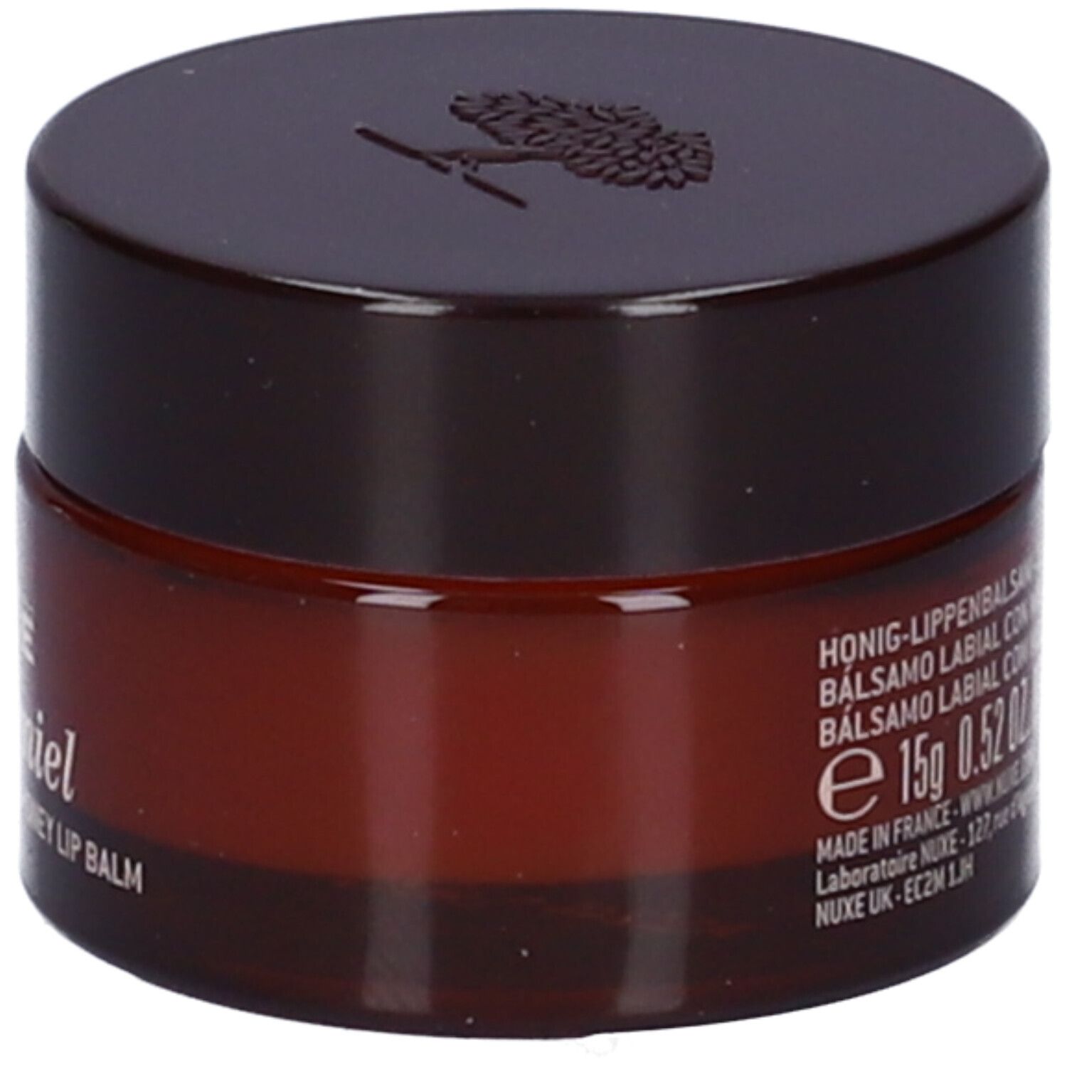 Vasetto marrone con coperchio. Scritta: Balsamo labbra al miele, 15g, 0.52 OZ. NET WT.