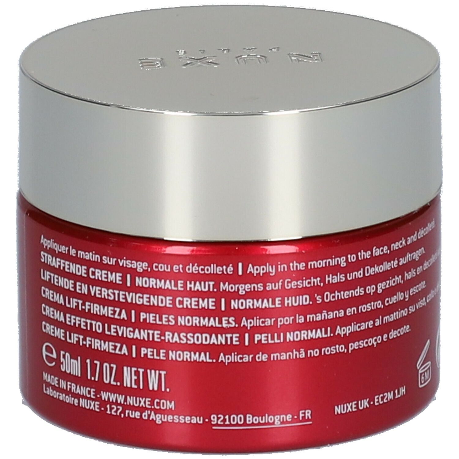 Roter Tiegel mit silbernem Deckel. Aufschrift: Merveillance Expert, Crème Lift-Fermeté, NUXE Paris. Text in mehreren Sprachen.