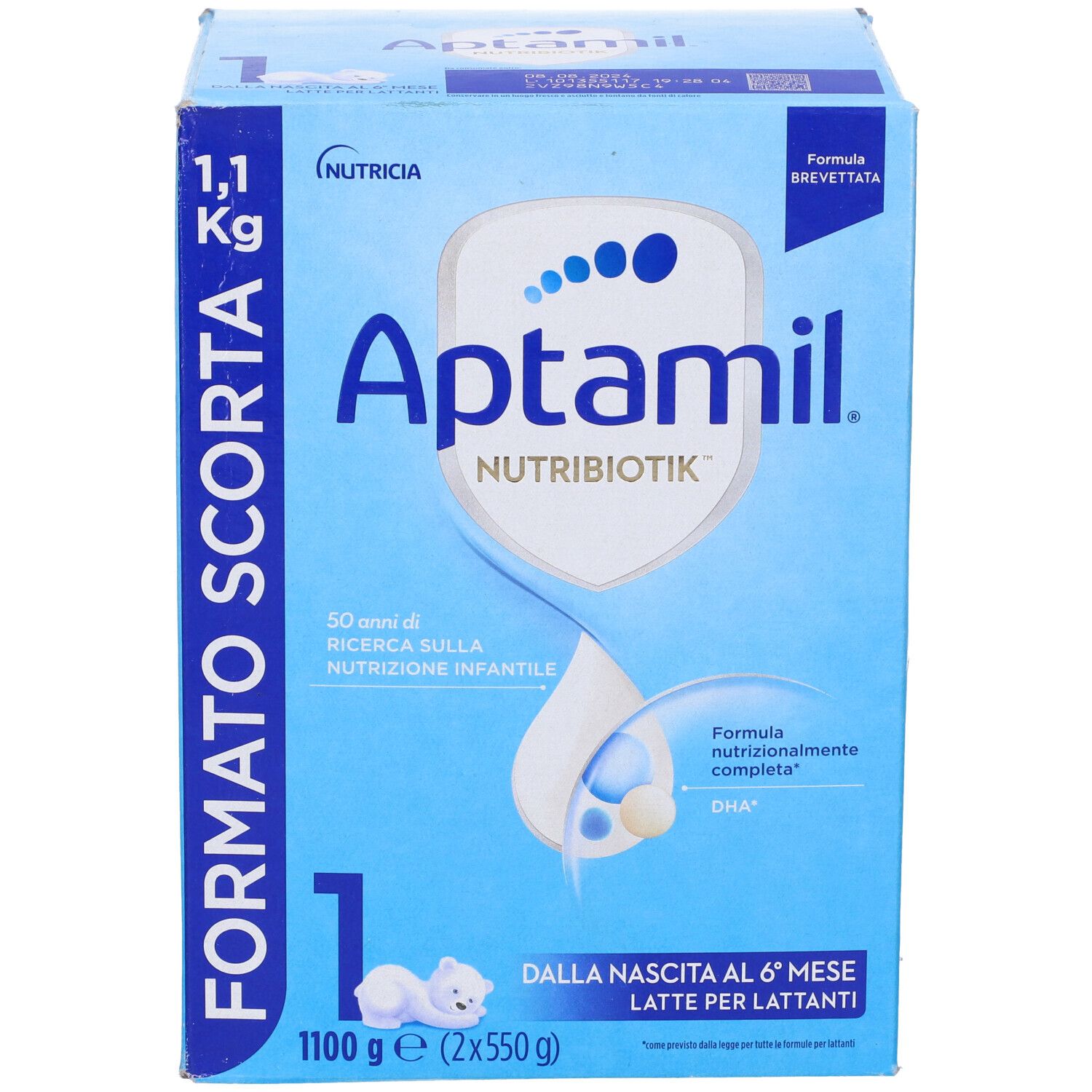 Confezione blu Aptamil 1, 1,1 kg. Scritto FORMATO SCORTA. Per neonati da 0 a 6 mesi. Contiene 2x550g.
