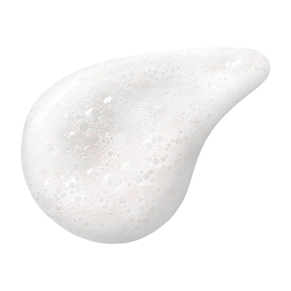 Produit blanc et mousseux. Forme en goutte avec des bulles.