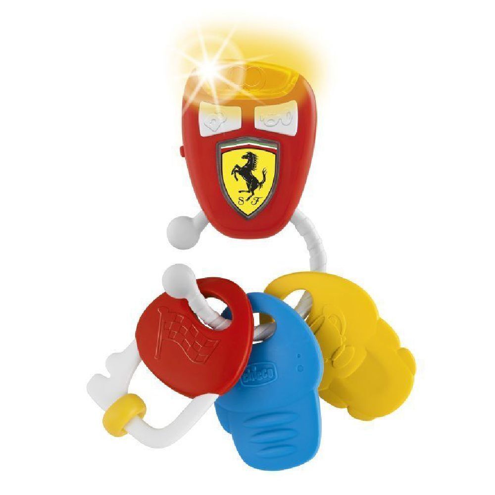Set di chiavi giocattolo rosse con logo Ferrari. Include chiavi gialle, blu e rosse. Con effetti luminosi.