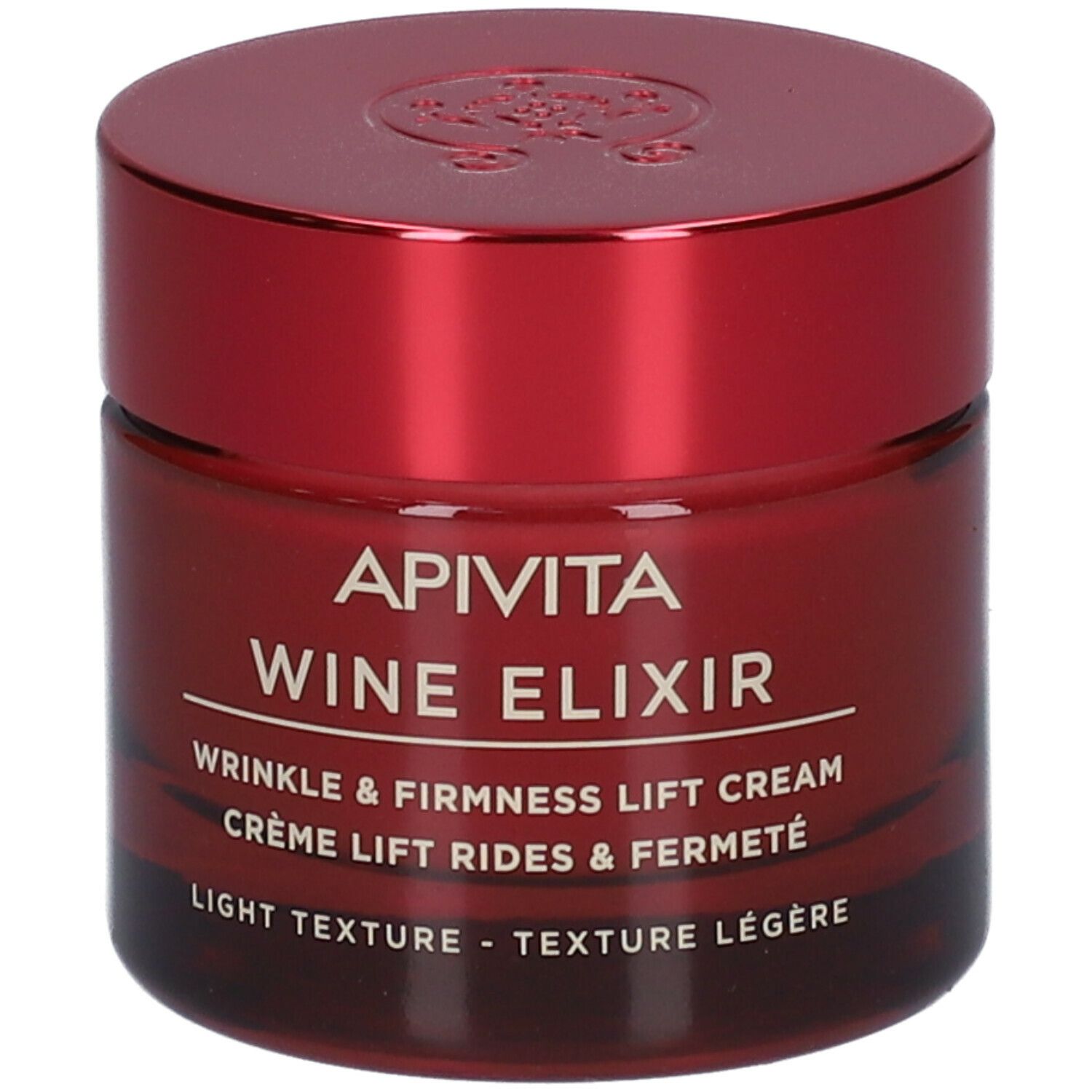 Vaso di crema rosso con coperchio. Scritta: APIVITA Wine Elixir, crema antirughe. Texture leggera.