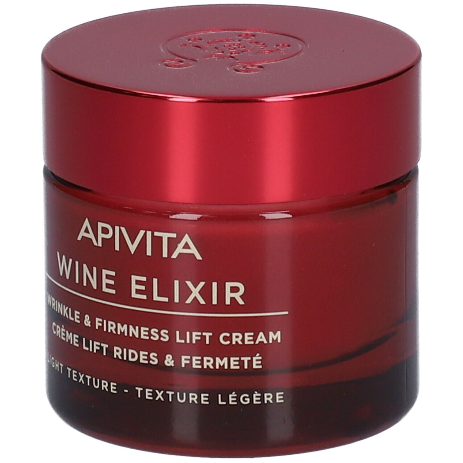Vaso di crema rosso con coperchio. Scritta: APIVITA Wine Elixir, crema antirughe. Texture leggera.