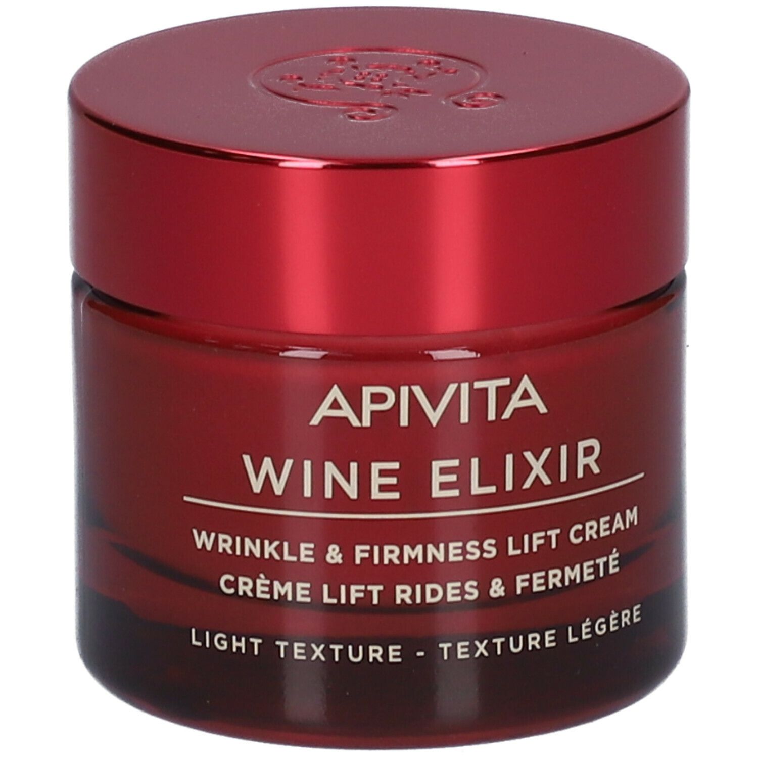 Vaso di crema rosso con coperchio. Scritta: APIVITA Wine Elixir, crema antirughe. Texture leggera.