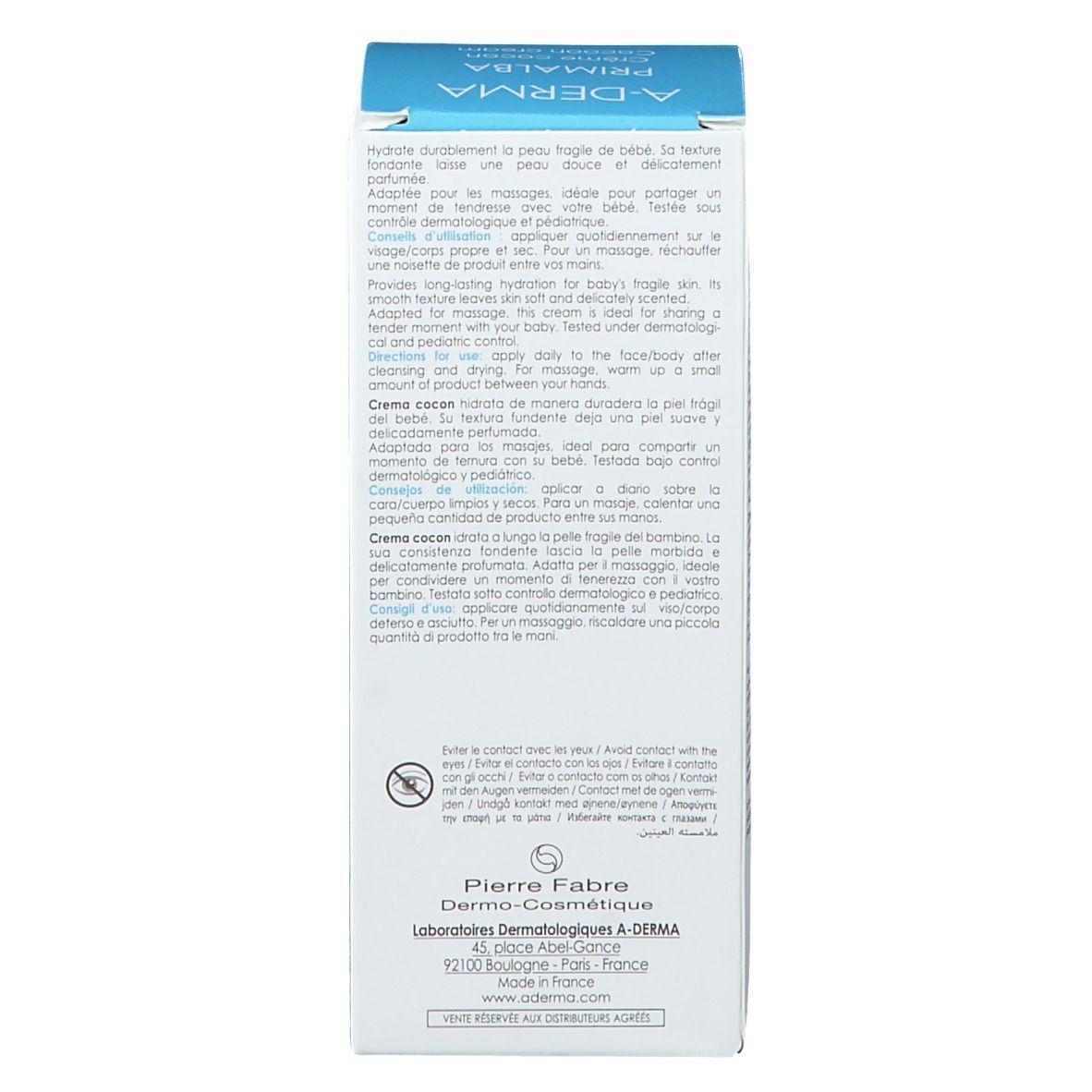 Lato della confezione in cartone. Testo multilingue. Istruzioni per l'uso. Indirizzo del produttore.