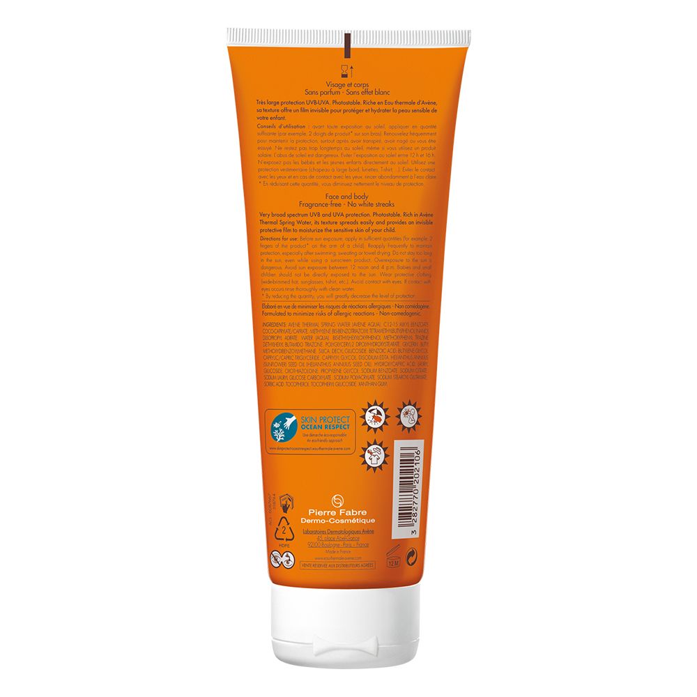 Dos d'un tube orange. Informations textuelles, logos et code-barres. Bouchon blanc.