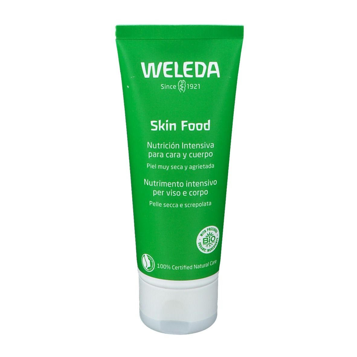 Tubo verde con tappo bianco. Testo: WELEDA, Skin Food, Nutrición Intensiva, Nutrimiento intensivo. Certificazione bio.