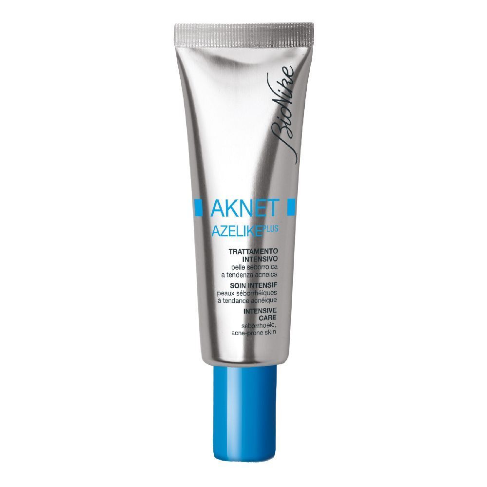Tube argentée, bouchon bleu. Inscription: AKNET AZELIKE PLUS. Marque: Bionike. Texte: Soin intensif.