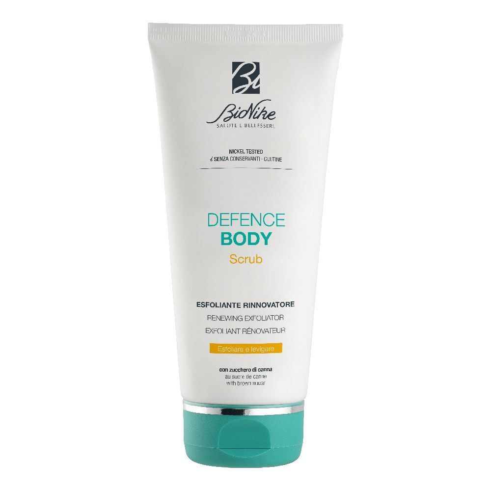 Tube blanc avec bouchon vert. Inscription : Defence Body Scrub. Marque BioNike. Texte en allemand et italien.