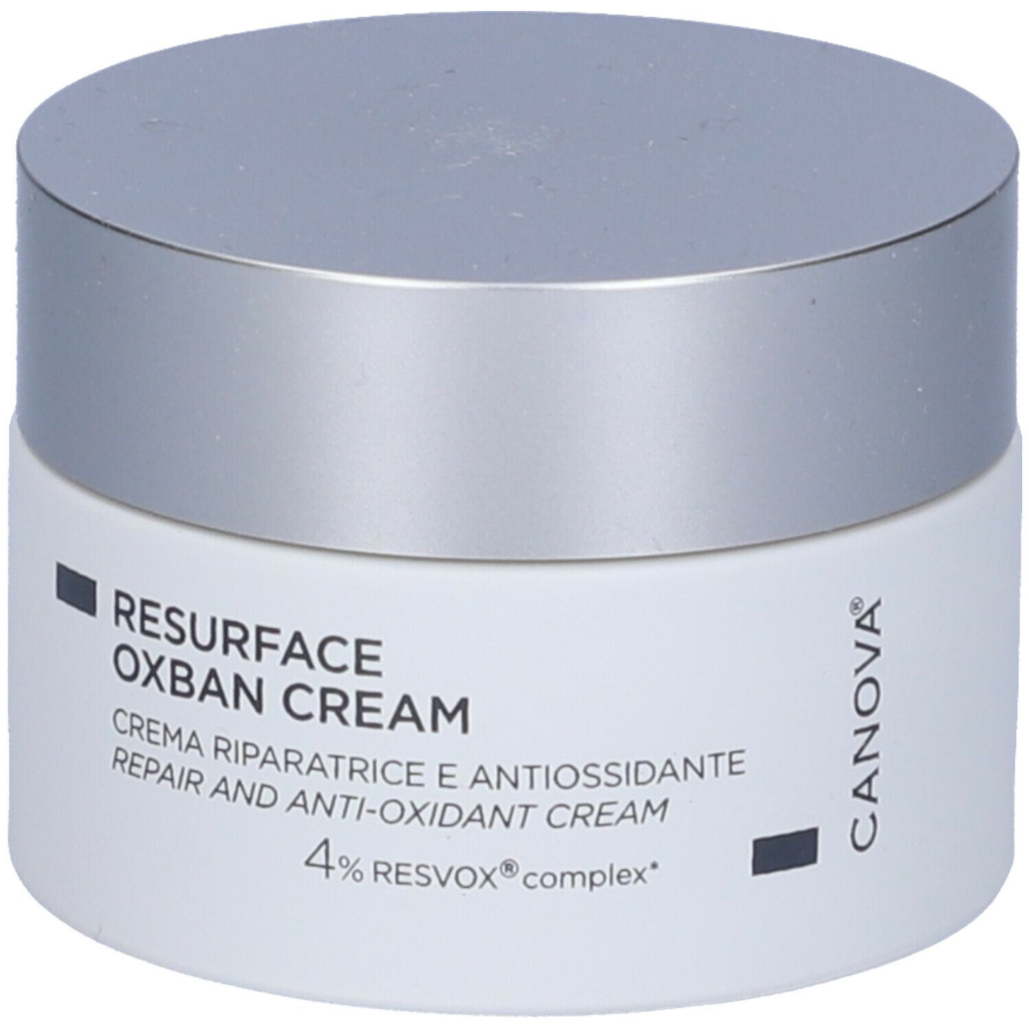 Vasetto di crema con coperchio argentato. Scritta: RESURFACE OXBAN CREAM, Crema riparatrice e antiossidante, 4% RESVOX complex.