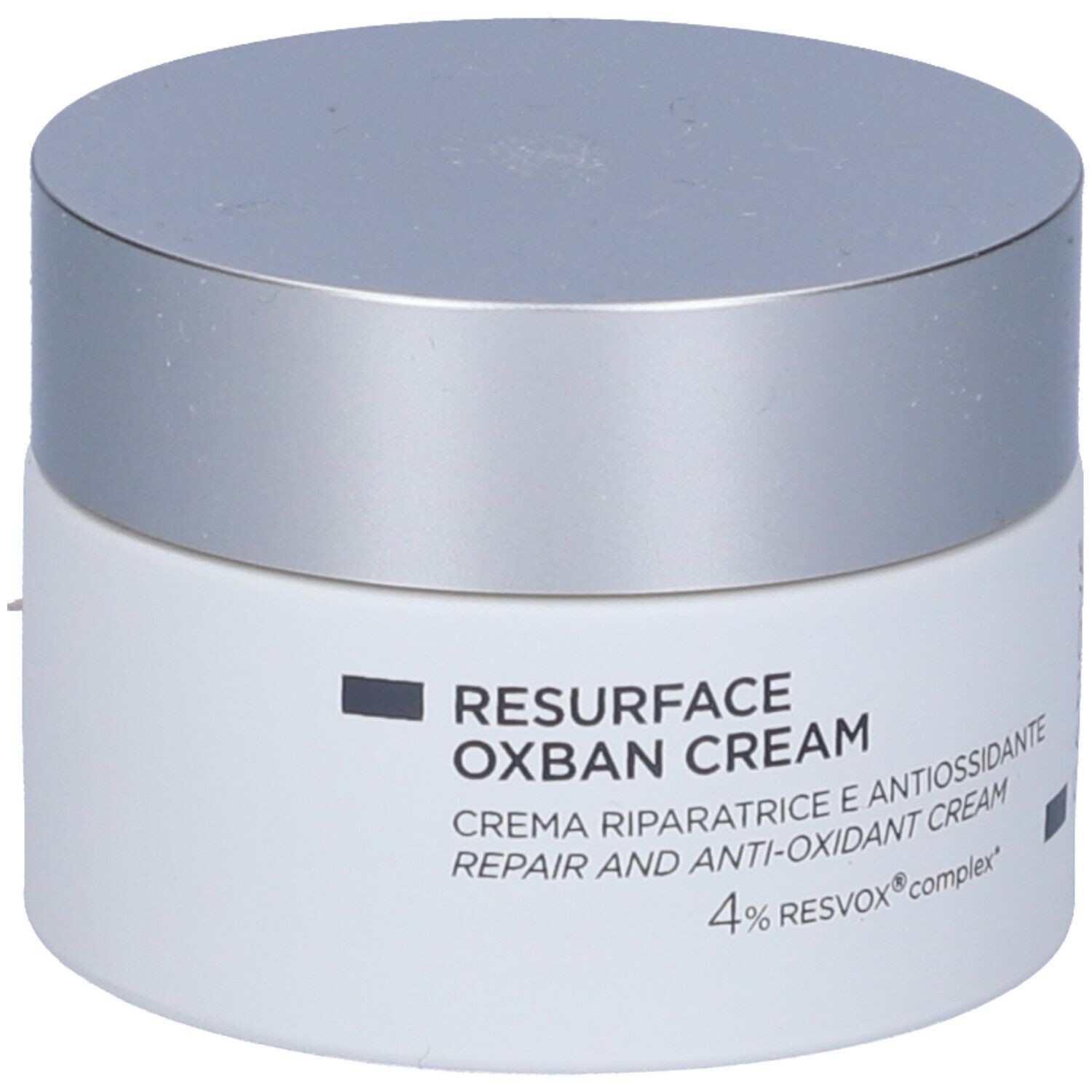 Vasetto di crema con coperchio argentato. Scritta: RESURFACE OXBAN CREAM, Crema riparatrice e antiossidante, 4% RESVOX complex.