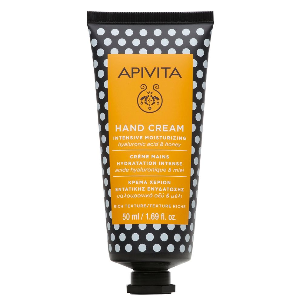 Tubo di crema a pois neri. Scritta: APIVITA, Hand Cream, idratazione intensa.