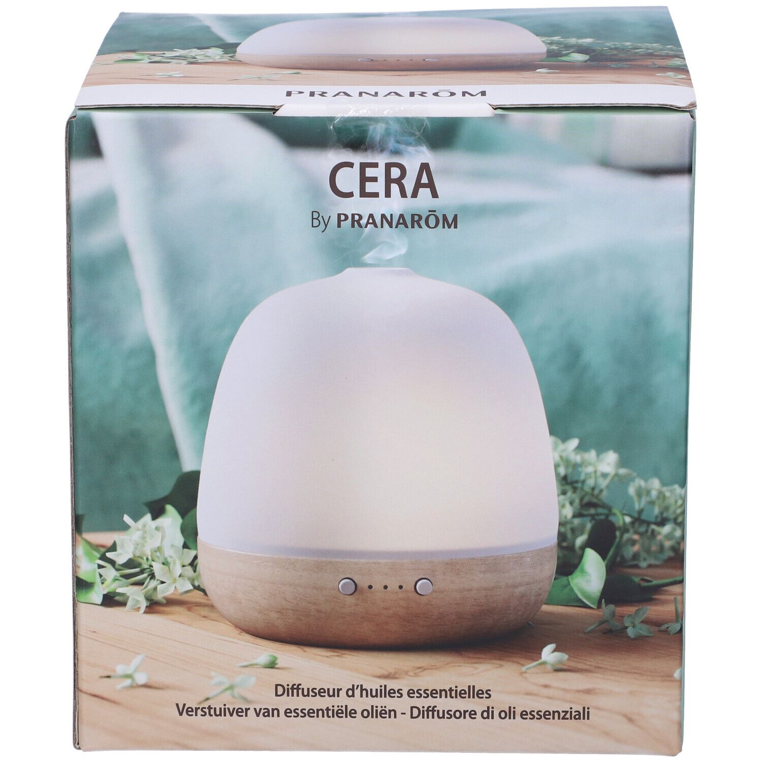 Confezione del diffusore. Scritta "CERA by PRANAROM". Diffusore bianco e legno.