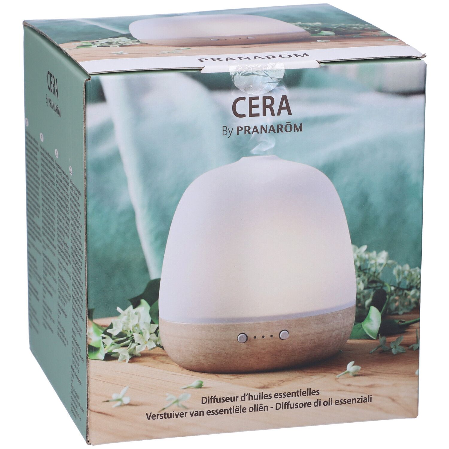 Confezione del diffusore. Scritta "CERA by PRANAROM". Diffusore bianco e legno.