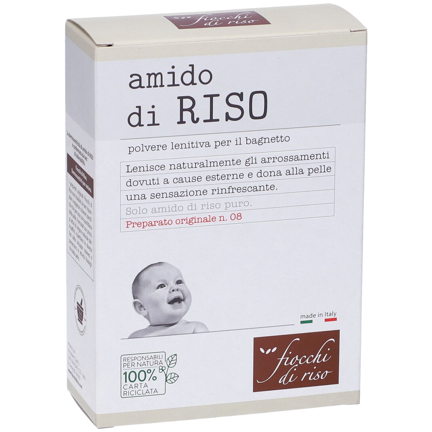 Scatola bianca "amido di RISO" con foto di bambino. Testo: "polvere lenitiva per il bagnetto". Logo "fiocchi di riso".