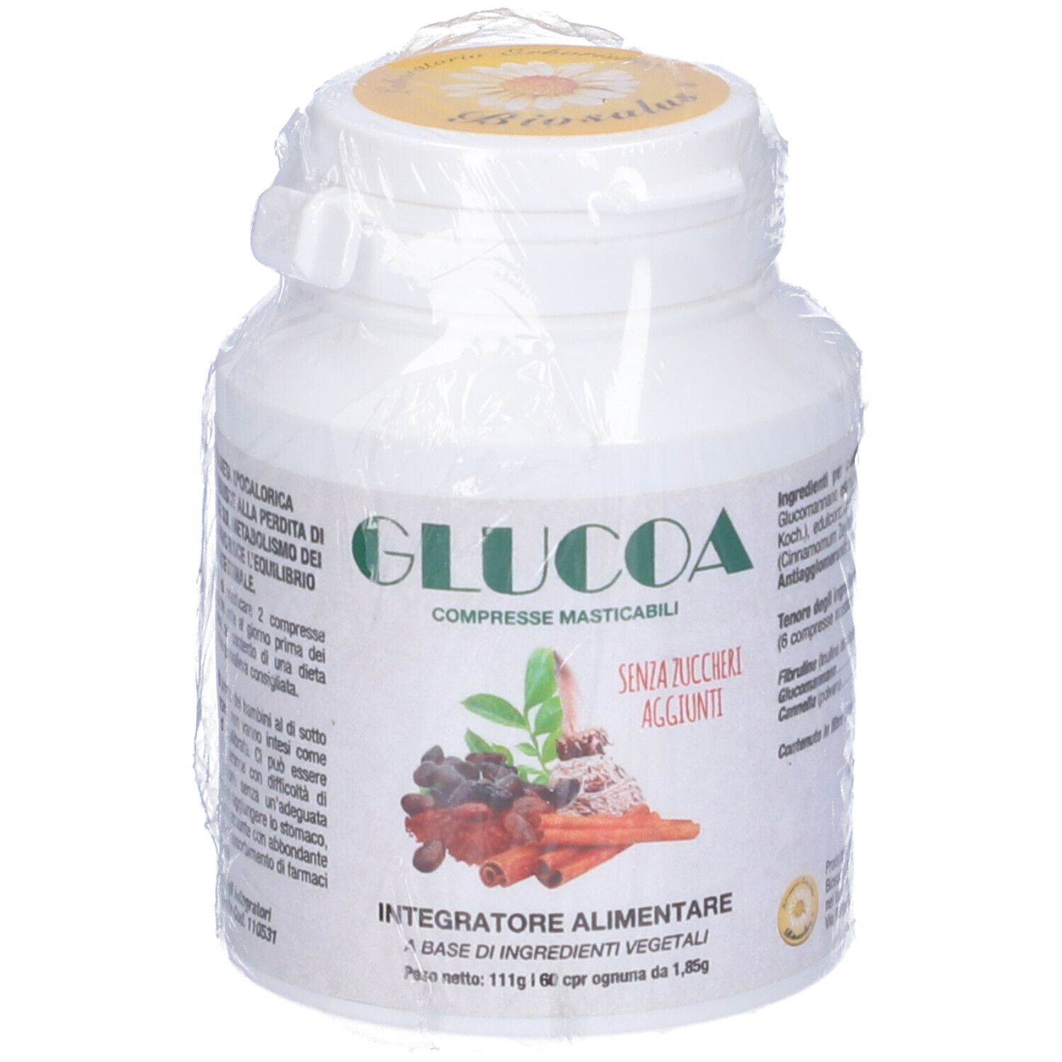 Flacone bianco "GLUCOA" in confezione di plastica. Visibili le scritte "COMPRESSE MASTICABILI" e "SENZA ZUCCHERI AGGIUNTI".