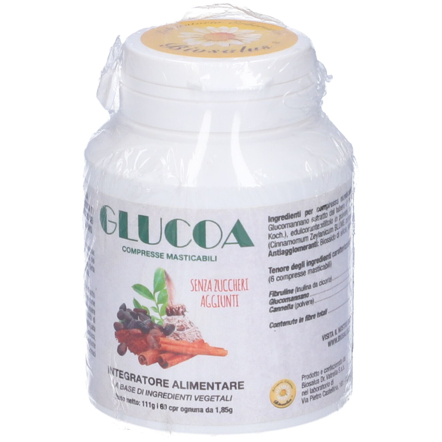 Flacone bianco "GLUCOA" in confezione di plastica. Visibili le scritte "COMPRESSE MASTICABILI" e "SENZA ZUCCHERI AGGIUNTI".