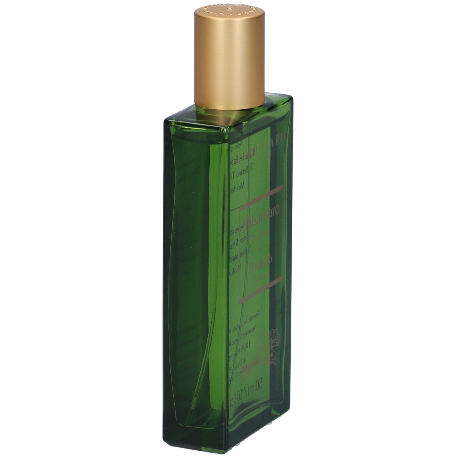 Flacone verde con tappo dorato. Etichetta con testo.