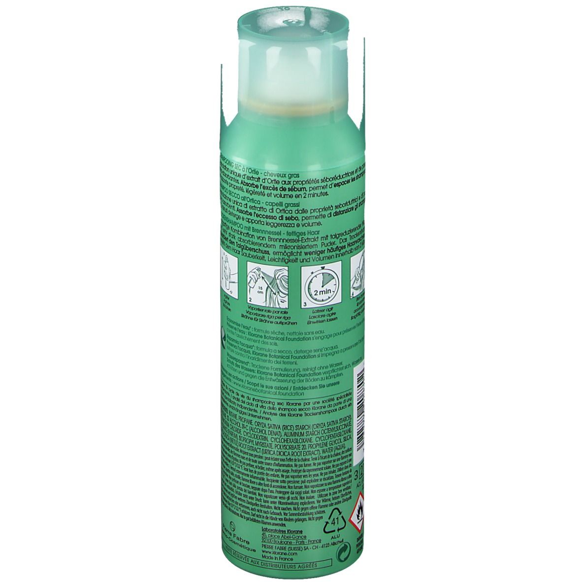 Flacon spray vert avec étiquette blanche. Shampooing sec KLORANE à l'ortie. Bouchon verdâtre. Dos avec instructions.