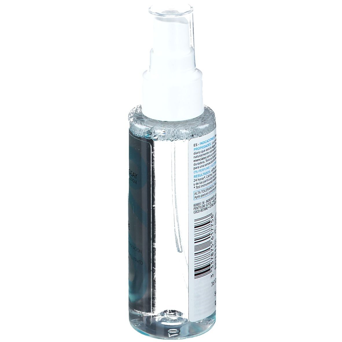Flacone spray trasparente con erogatore bianco. Retro con testo e codice a barre. Testo: ingredienti, informazioni produttore, simbolo riciclo.