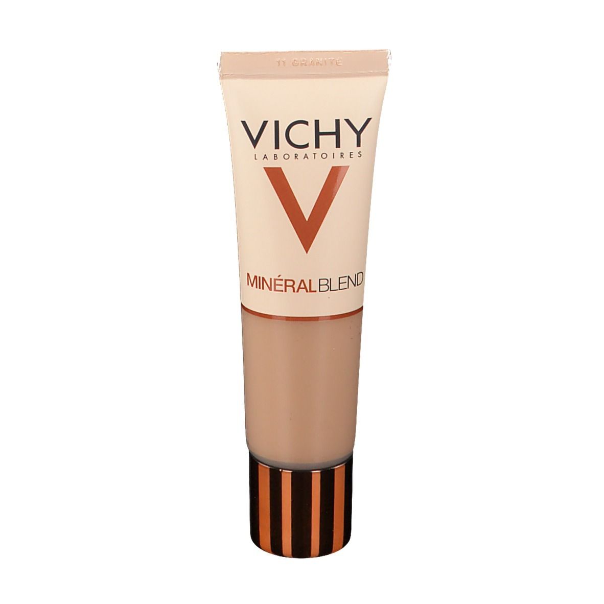 Tube beige avec inscription VICHY et Mineralblend. Avec un couvercle marron.