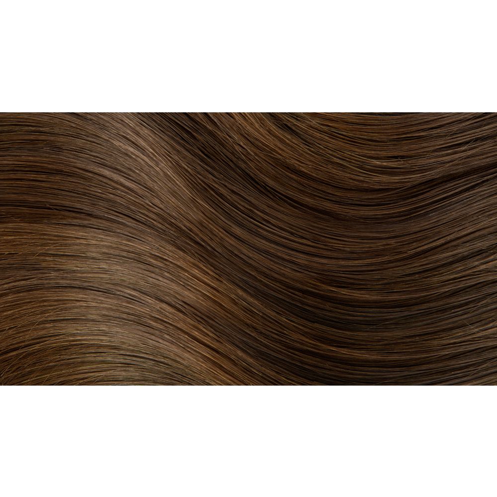 Ciocca di capelli biondo scuro. Texture e sfumature. Aspetto naturale.