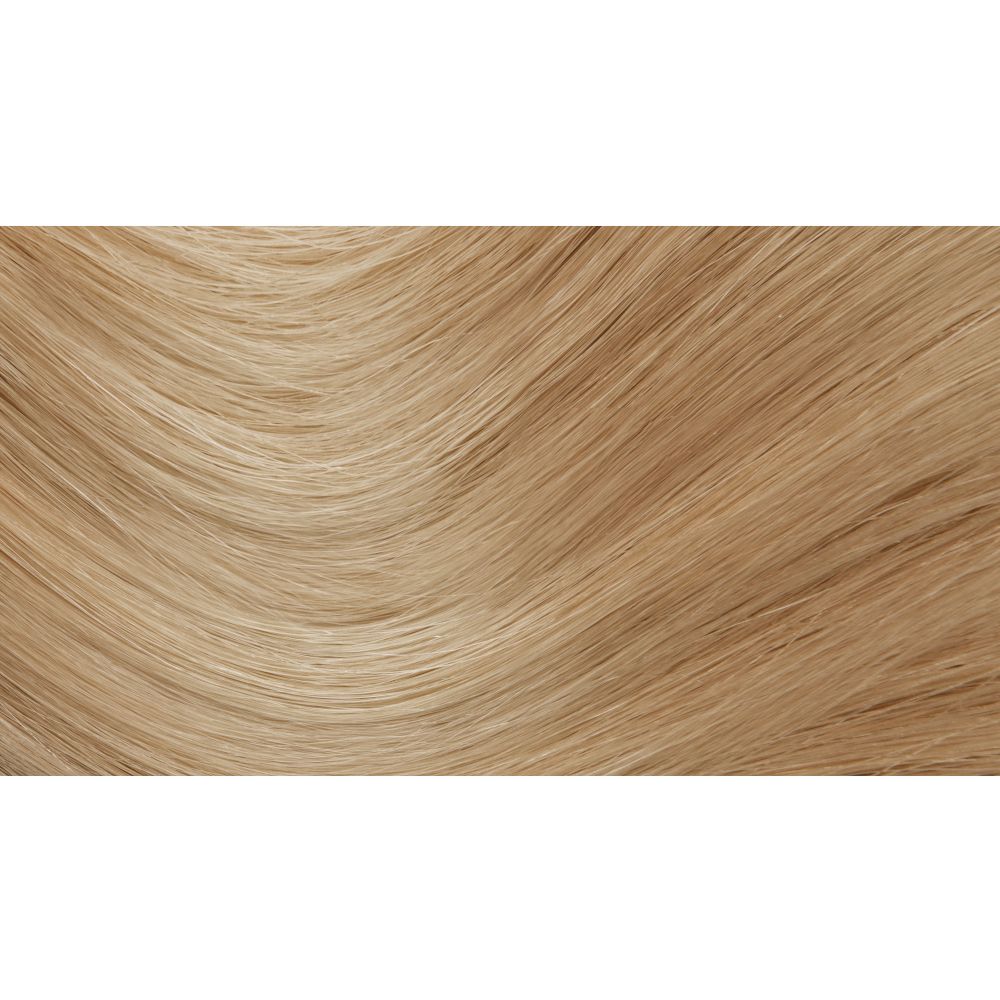 Strähnen von blondem Haar. Honigblond. Wellenförmige Struktur. Helle Beleuchtung.