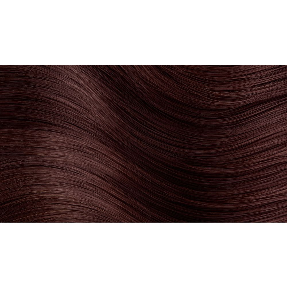 Primo piano di capelli castani. Ciocche ondulate. Nessun altro dettaglio visibile.