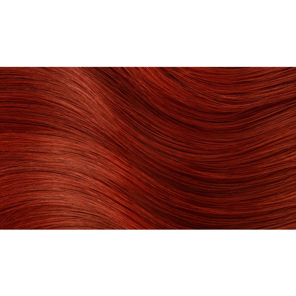 Primo piano di capelli rosso-viola. Tonalità. Texture. Onde. Nessun imballaggio o informazioni sul prodotto visibili.
