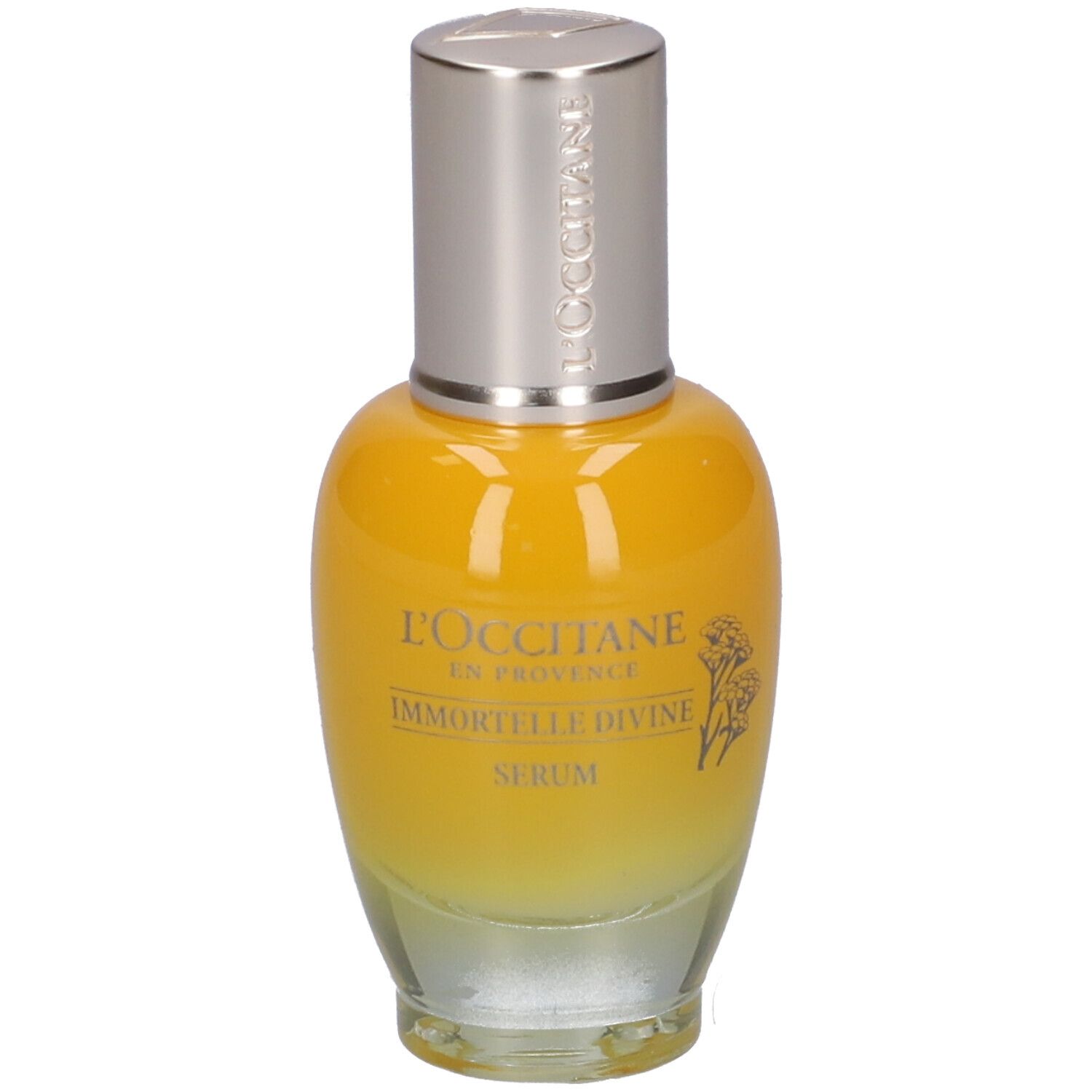 Flacone di siero giallo trasparente con tappo argentato. Scritta: L'Occitane, Immortelle Divine Serum.