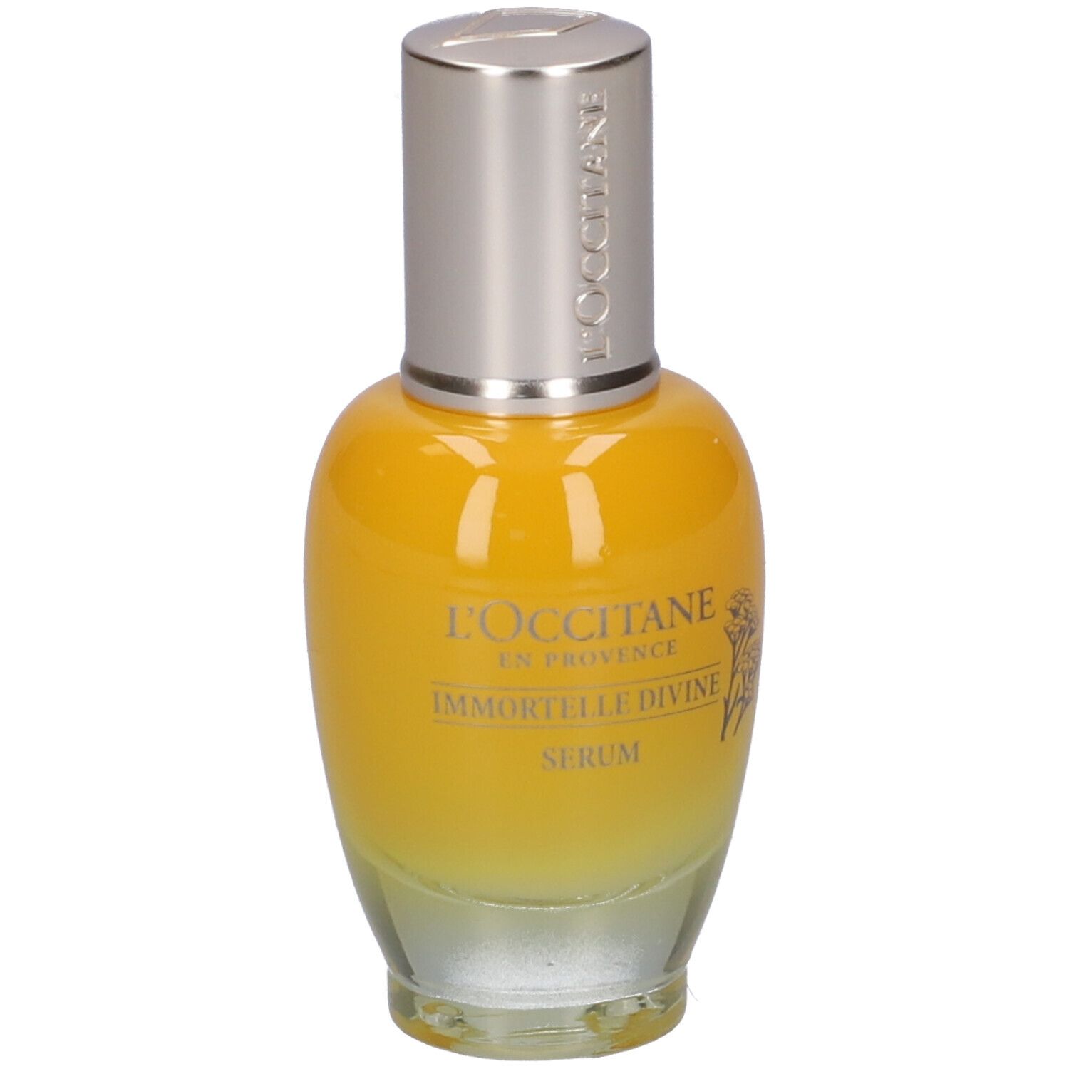 Flacone di siero giallo trasparente con tappo argentato. Scritta: L'Occitane, Immortelle Divine Serum.