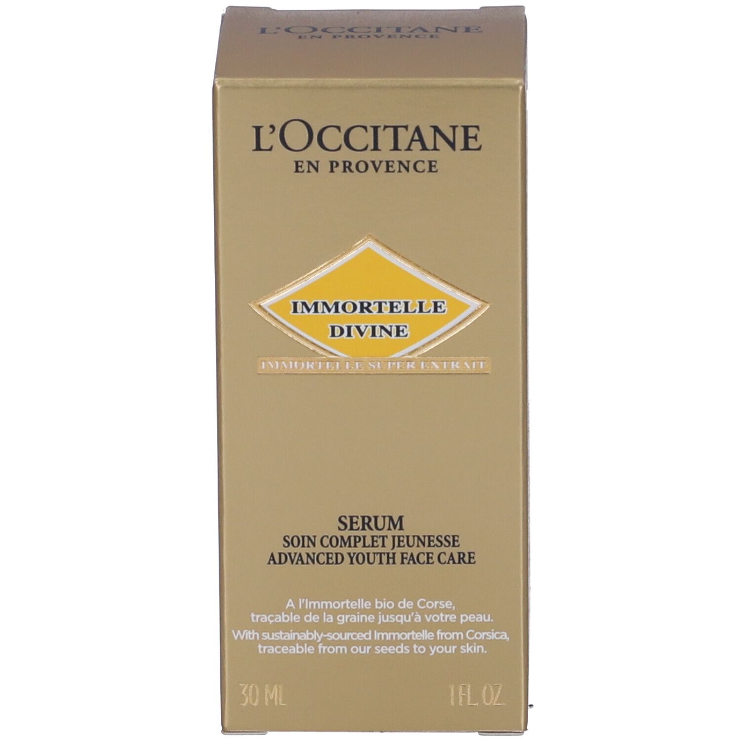 Scatola dorata. Scritta: L'Occitane, Immortelle Divine Serum. Soin Complet Jeunesse.