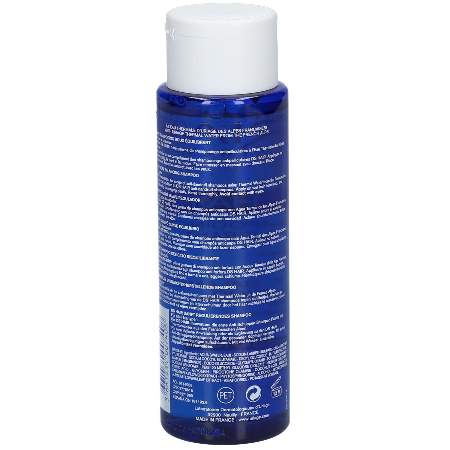 Rückseite der blauen Flasche mit weißem Deckel. Text in mehreren Sprachen. Herstellerinformationen.