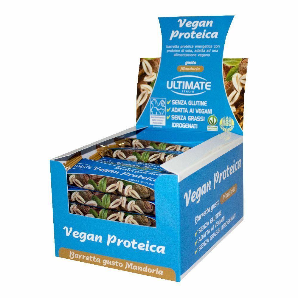 Scatola blu e bianca di barrette proteiche. Scritto: Vegan Proteica, Mandorla. Senza glutine, vegano, senza grassi idrogenati.