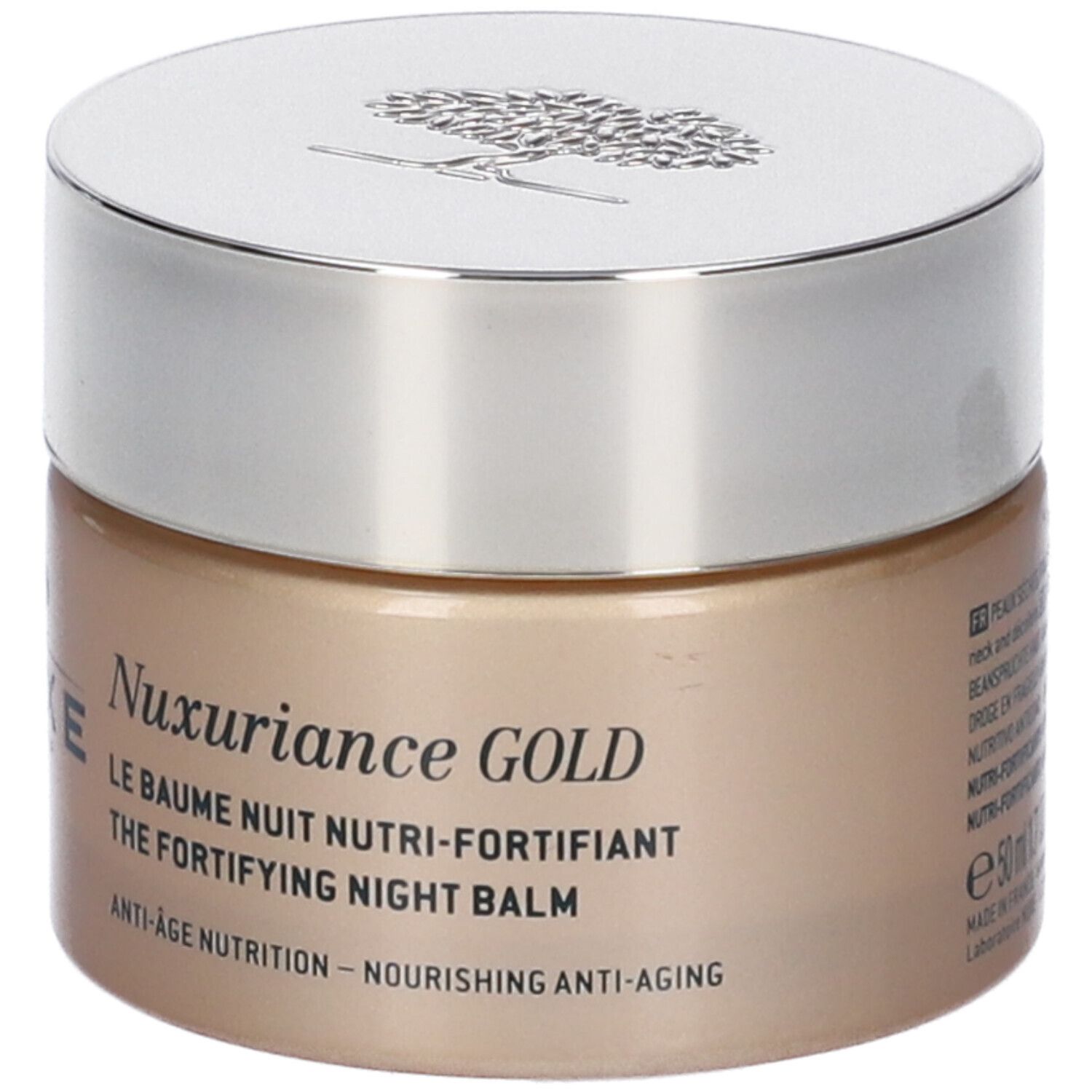 Vaso di crema con coperchio argentato. Scritta Nuxe Paris e Nuxuriance Gold. Testo: Le Baume Nuit Nutri-Fortifiant, Anti-Age Nutrition.