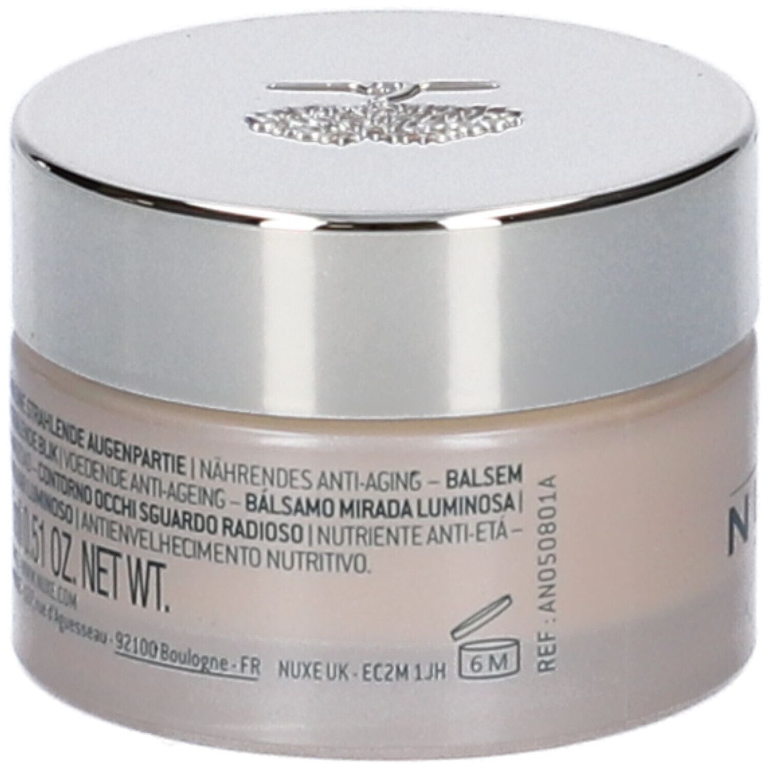 Vasetto di crema con coperchio argentato. NUXE, Nuxuriance e testo multilingue sul vasetto.