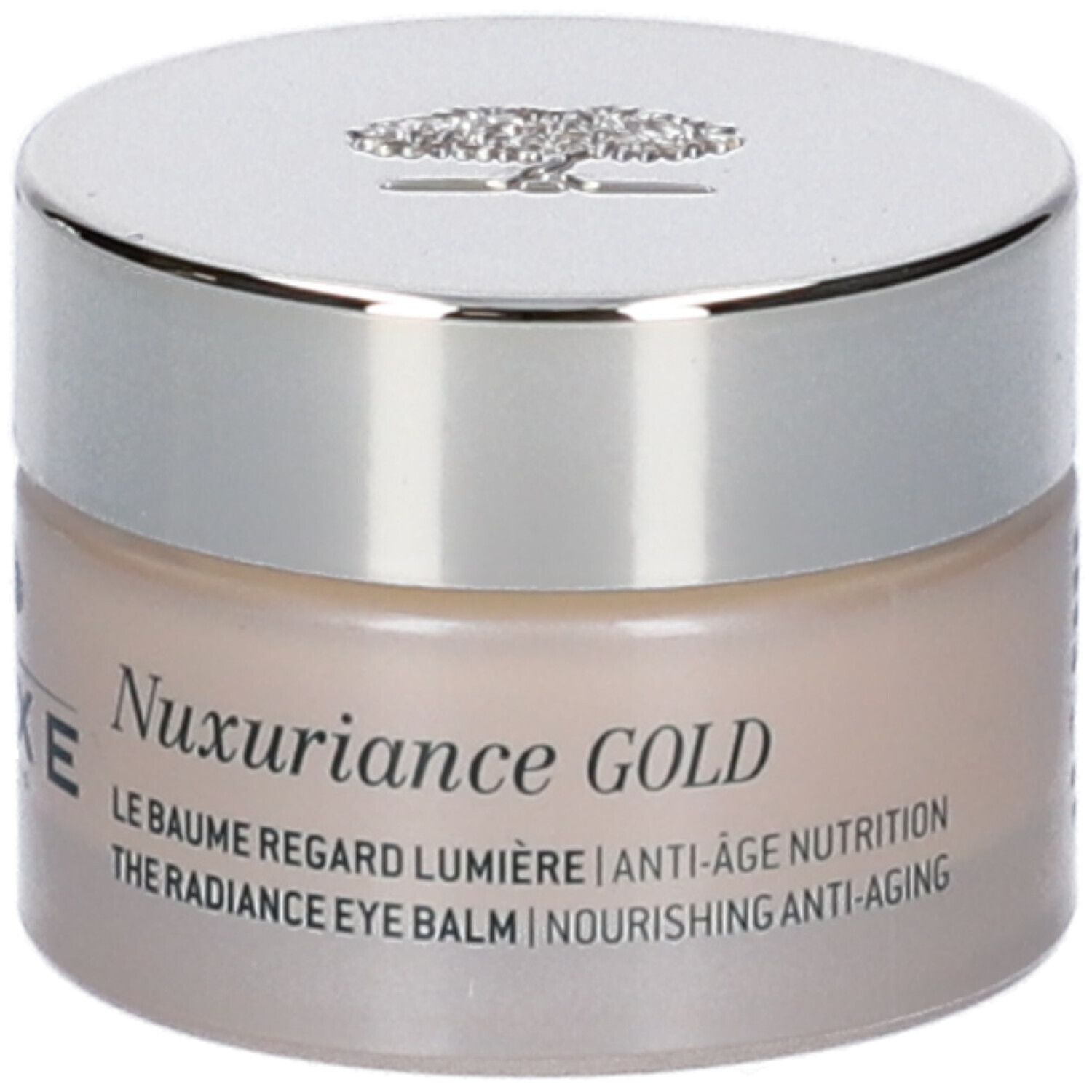 Vasetto di crema con coperchio argentato. Nuxuriance Gold e testo multilingue sul vasetto.