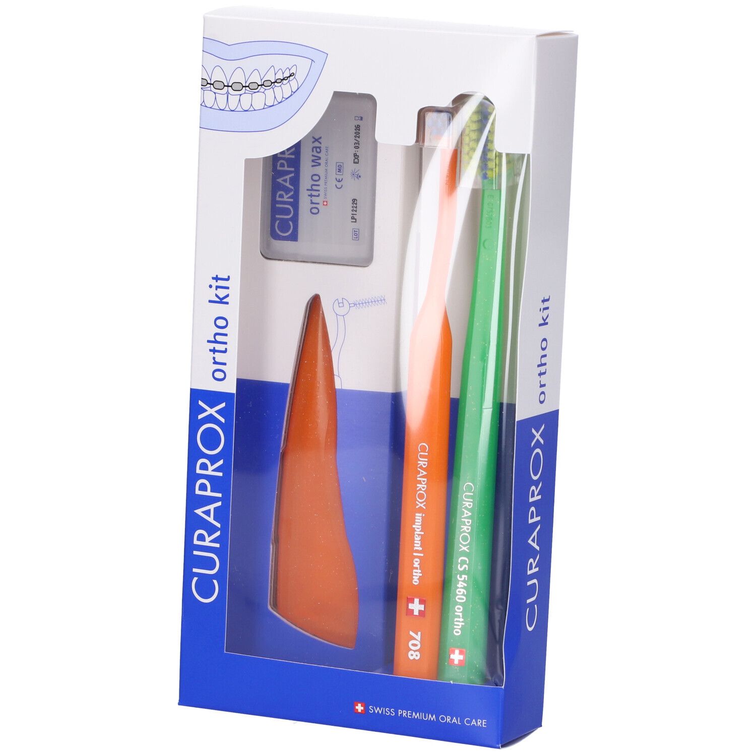 Set igiene orale in scatola. Include spazzolini, filo e cera. Applicatore arancione.