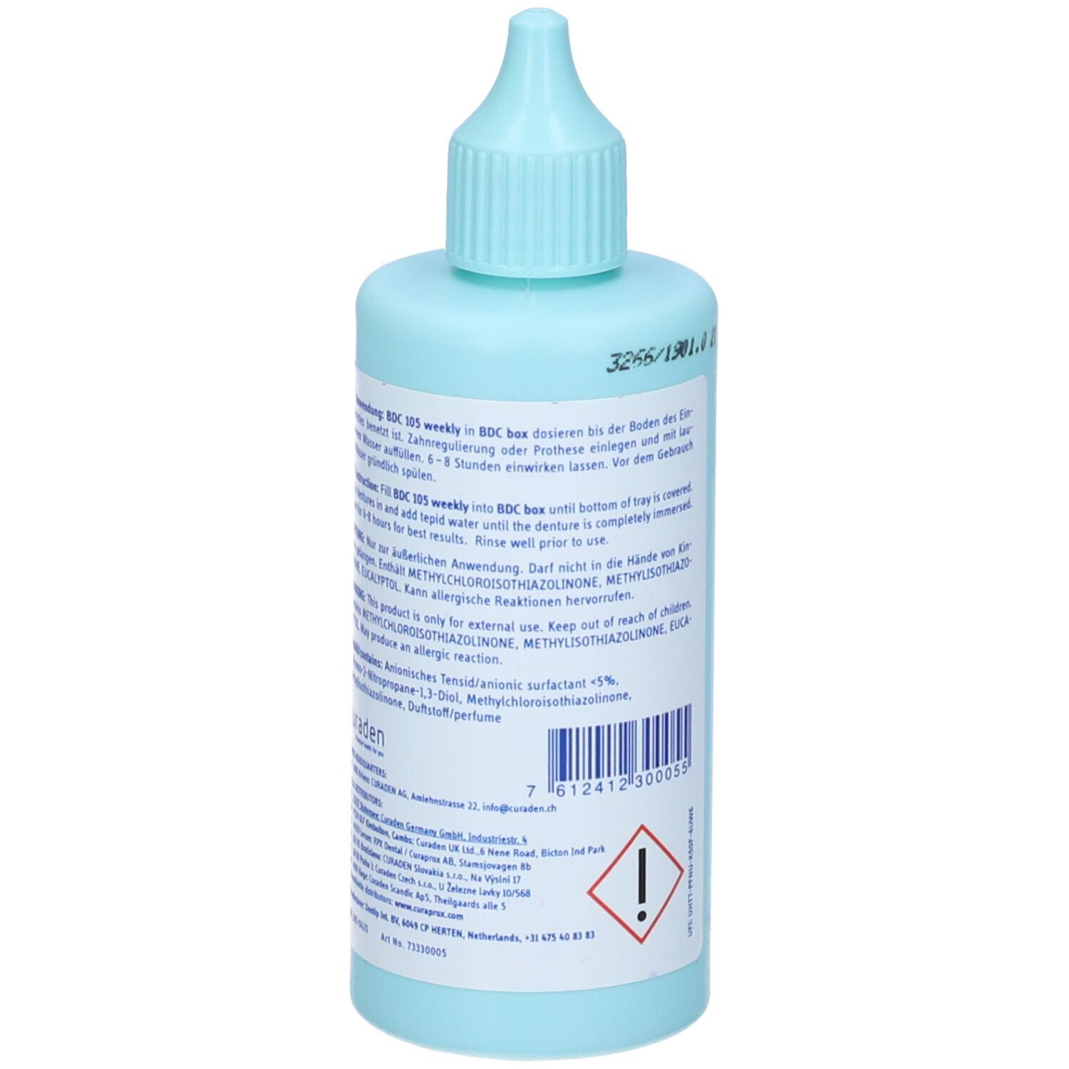 Flacone azzurro con beccuccio dosatore. Retro con testo e avvertenze. Testo: dental appliance bath weekly.