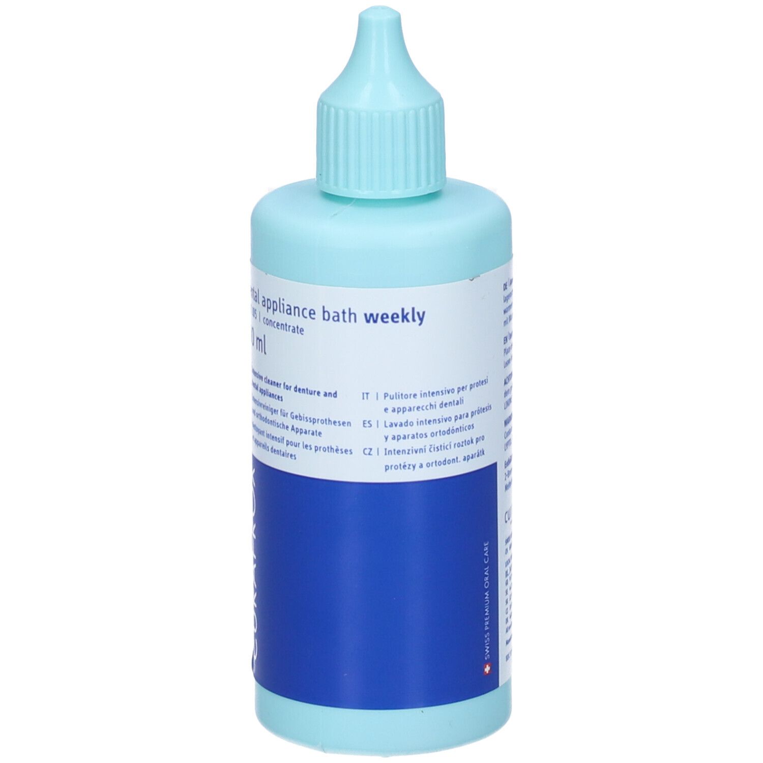 Flacone azzurro con beccuccio dosatore. Etichetta blu con logo CURAPROX. Testo: dental appliance bath weekly.